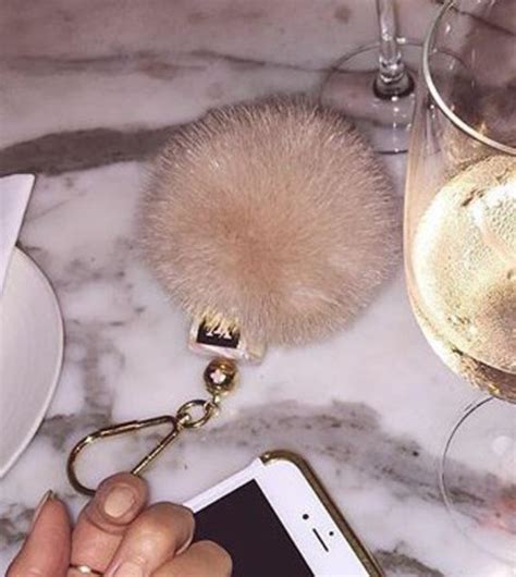 louis vuitton fur ball keychain